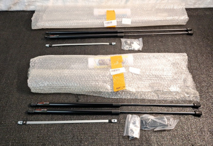 (2) 2-Piece Hood/Trunk Support Shock Sets, (1) 27"L Set, (1) 31"L Set