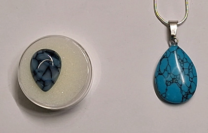 (1) 8.85ct Blue / Black Dragon Vein Agate, Pear Cut & (1) Natural Stone / Crystal Pendant W/ .925 Silver Necklace
