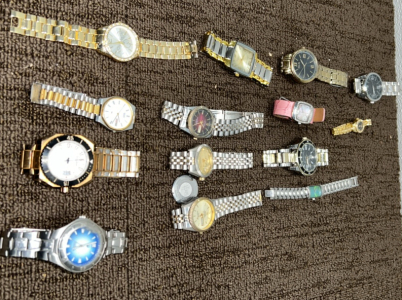 (14) Assorted watches; Fossil, Rolex Replica , & More Brands.