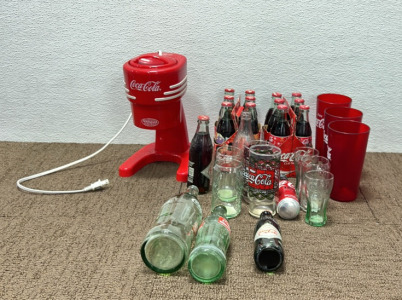 Coca Cola Products; Ice Shaver Working Machine,Plastic Cups ,Drinking Glasses ,Few Bottles Check Photos and In Person.