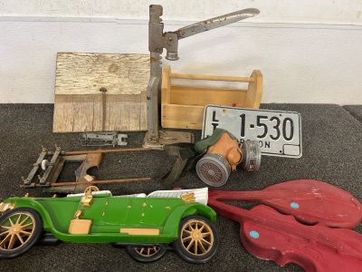 Everedy Climax Bottle Capper.&nbsp;<br/>Foothold Animal Trap<br/>Router Edge Guide<br/>Wooden Toolbox <br/>License Plate<br/>Reusable Cartridge Respirator<br/>Vintage Cast Metal Mandolin/Violin <br/>Vintage Burwood Products Wall Hanging