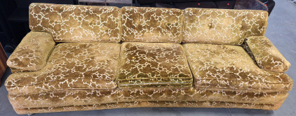 Green Couch with Floral Design