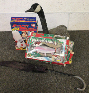 Decoy Goose, Super Slicer, Travis The Singing Trout, And An Umbrella