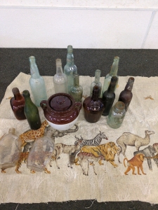 Safari Backdrop, Old Bottles And Miscellaneous Glassware