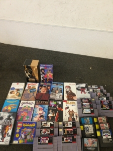 VHS Tapes Movies and Nintendo Games