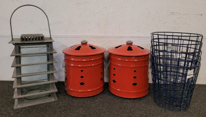 Beautiful Red Stainless Steel Burn Drums, Wire Waste Baskets, And A Decorative Lantern