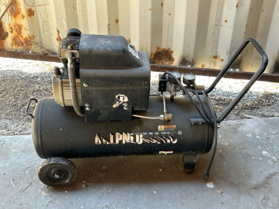 OFFSITE CALDWELL - Black Rolling Air Compressor