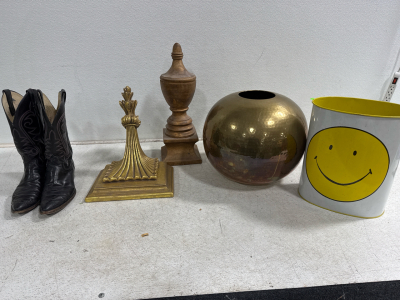 Assorted decor, trashcan, and cowboy boots