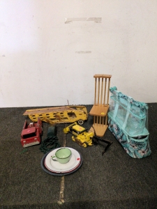 Metal trucks and old phone a cute bag and two table legs