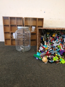 Two Bamboo Drawer Organizers and a Jar for punch and a basket of Legos