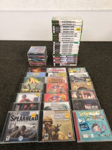 Assortment of PC Games and PlayStation 2 Games Including Tomb Raider, Ghost Recon, and More