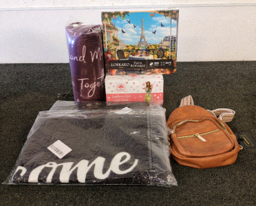 Red Nana Blanket, Paris Puzzle, Angel Candle Holder, (2) Brown Welcome Mats, And Brown Purse
