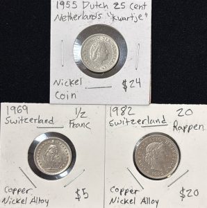 Scandinavian Coins Including; 1955 Dutch Kwartje Coin, 1969 Franc Coin, And 1982 20 Rappen Coin