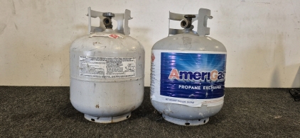 (2)Propane Tanks (15lbs)(One Empty, One About Half Full)