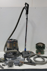 Rainbow E Series Vacuum Cleaner, Specifically The E2 Model With Accessories And Coleman 5000 BTU Catalytic . Coleman 5000 BTU Catalytic Heater, Specifically A Model 511A.