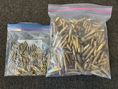 Mixed 22 Long Rifle Ammunition and Bag Of Mixed Brass Casings: 30-06, 264 Win Mag, 40 Cal, 5.56x45 mm