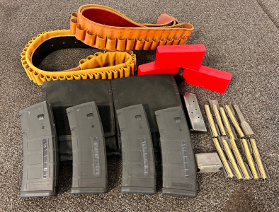 (2) Ammo Belts, Magazine Holder and (4) 5.56x 45 Magazines, (3) Red Ammunition Organizers, Stripper Clips, and More