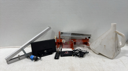 Assorted Lot Of Items (2) Clay Pigeon Thrower (1) Sony Alarm Clock (1)The Standard Inc Streaming Service Box w/remote. and more
