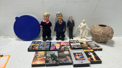 Bill And Hilary Doll And 1 Small Bill Clinton Doll, White Ceramic Statue of Jesus, Decorative Pot, Assorted VHS Movies, Tupperware Large Round Container