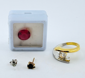 (1) 10k Gold Earring, (1) Sterling Silver Earring (1) Gold & Silver Toned Ring & (1) Red Gem