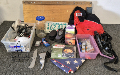 (2) Boxes of Miscellaneous Tools, Under Car Workmans Tool, Camping Stove Toaster, Vacuum Accessories, American Flag, Hunters Knife, Multi-Tool Hatchet, Glass Jar, Air Pump(Works), Corvette Racing Jacket, Old License Plates, Lighter, Compass, Face Masks