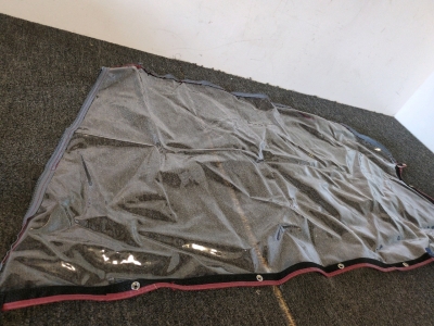 Maroon Canvas boat cover with clear window areas