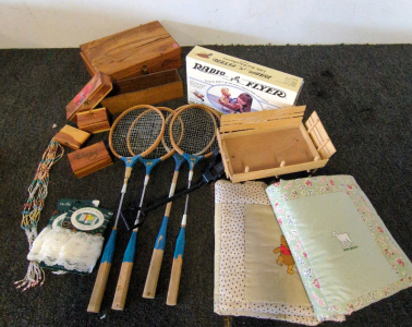 Antique assortment of wooden boxes plus rackets and two babay quilts