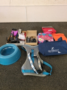 Lunch boxes and dog harness and leash and training collars and remotes