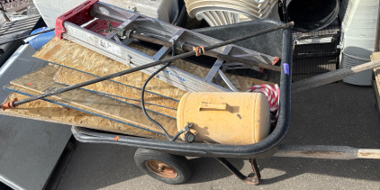 Wheelbarrow Filled With (19) Pieces of Plywood H 3&rsquo; 9&rdquo; W 1&rsquo;, Ladder, Air Tank, Rope and Various Pipes