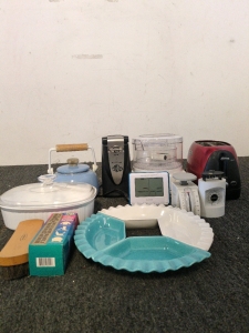 Toaster, electric can opener, vegetable steamer, tea kettle, kitchen scales and a few dishes