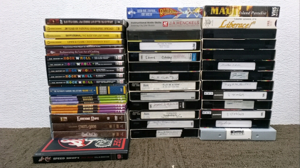 (26) VHS Tapes and (27) DVDs