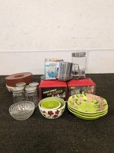 Dishes and two napkin dispensers flour sifter and an egg cooker and some jars