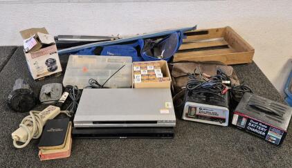 Schumacher 6/2AMP Dual Rate Battery Charger(Works), Chicago Electric Dual Rate Battery Charger 6/12V(Works), Sony DVD Player (2)(One Works, Other Needs Repair), Surge Protector(Works), Tool Organizer, Utility Pump(Unable to Test), Chandelier Flame Tip 60 