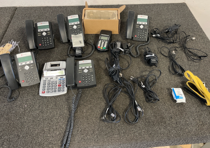 Polycom Landline Phones, Canon Clock And Calendar & A Receipt Printer.
