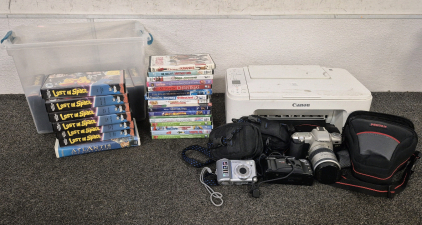 Canon Printer, Pentax Camera And Case, Canon Owl Camera With Case, Samsung Camera With Case, (17) DVDs, (17) Vintage VHS "Lost In Space" TV Show