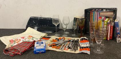 Miscellaneous Lot Including, Silverware, Wine Glasses, Placemats, Table Runner, Books Galore, And Microsoft Natural Ergonomic Keyboard 4000
