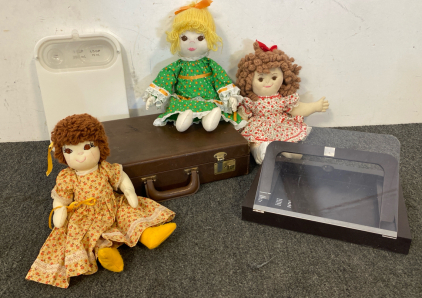Miscellaneous Lot Including Dolls, Briefcase, And Cookbook Stand