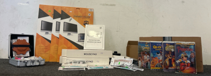 The Productivity And Nostalgia Pack- Including New Privacy Filters, Mousr Pads, Apple Watch Bands, And. Bundle Of Various VHS Movies Including Sandlot And Oliver And Company