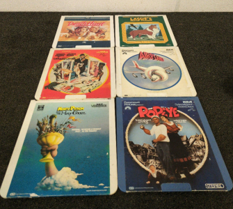 (6) Movie Video Disks Including; Popeye, Monty Python And So Many More!!