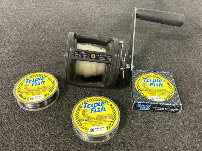 Heavy Duty Daiwa Fishing Reel and (3) Rolls of Triple Fish Camo-Escent Fish Line