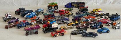 Various Hot Wheels and Matchbox Cars
