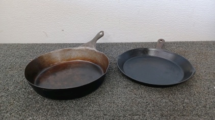 (2) Cast-Iron Pans