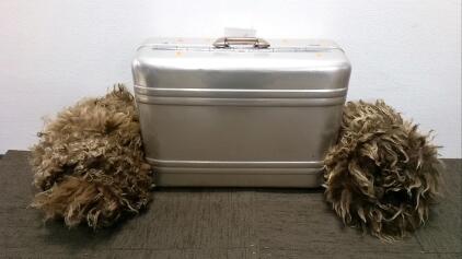 Locking Suitcase and (2) Faux Fur Skins