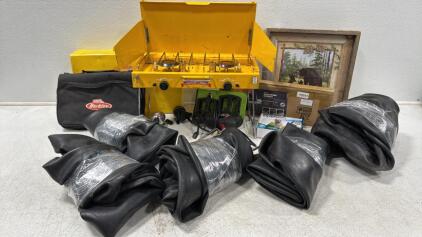 Assorted Outdoor Items (1) American Camper Dual Burner Stove (1) Dog Training Collar (5) River Floating Tubes (1) Berkley Fishing Tackle Bag and more ..