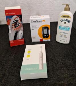 (1) Laser Therapy Hair Growth Comb, (1) CareSens N Blood Glucose Monitor, (1) Electric Toothbrush & (1) 20-Oz Bottle Of Gold Bond Lotion