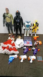 (7) Nerf Guns, (4) Action Figures, (2) Antique Dolls, and More
