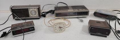 (1)Vintage 1950's Sears Homart Flashlight, (5) Vintage Electric Clocks, (1) Sears AM Radio