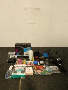 Netgear WiFi cable modem router pink calculator Logitech headphones two cameras hair dryer