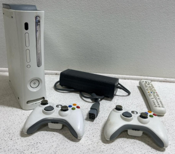 (1) Xbox360 Console w/ Two Controllers & Remote.