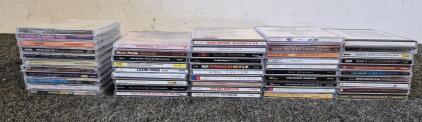 (4) CDs and (11) New Never Opened CDs( Alabama, Tennessee Ernie Ford, Placido Domingo, Brook Benton, Dean Martin, Leann Rimes, Roy Orbison, Clint Black, Linda Ronstadt, Kenny G, Ray Charles, Lefty Frizzel, and Much More!)